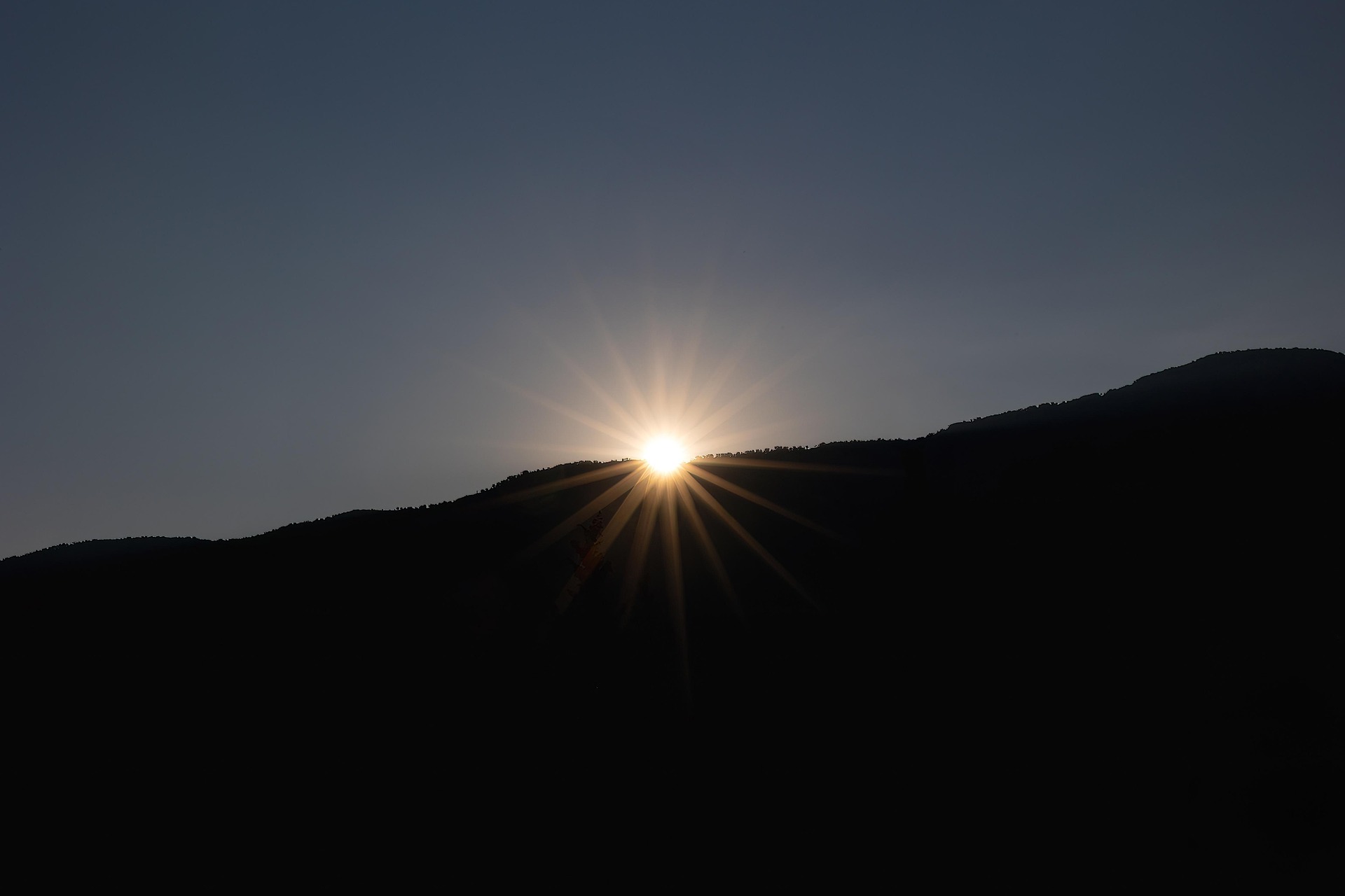 Golden sunrise over mountains